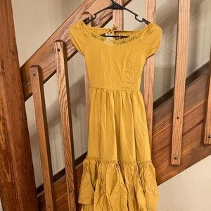Joyfolie ivony dress in gold size 10. New with tags. Pet and smoke free home.
